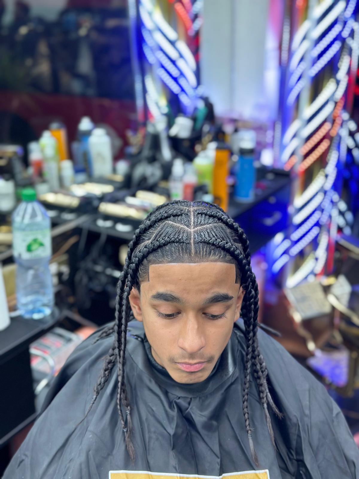 Braiding work at Gunners Barber