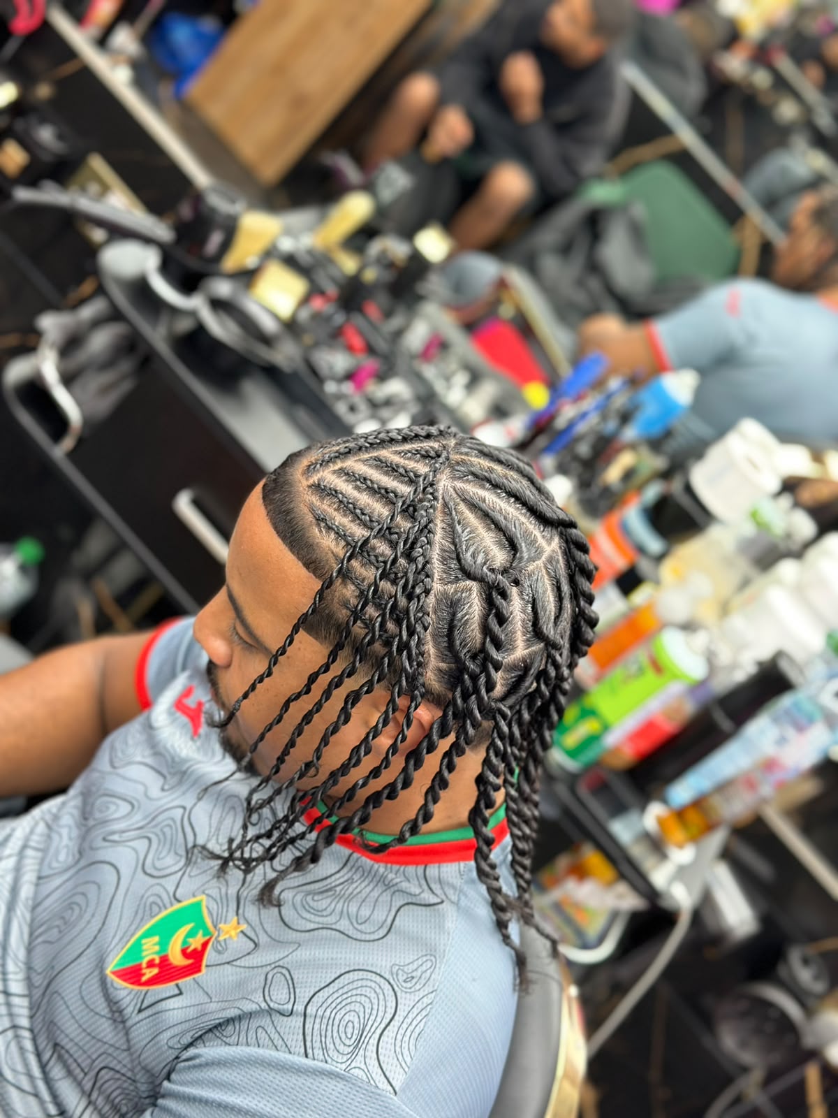 Client hairstyling at Gunners Barber