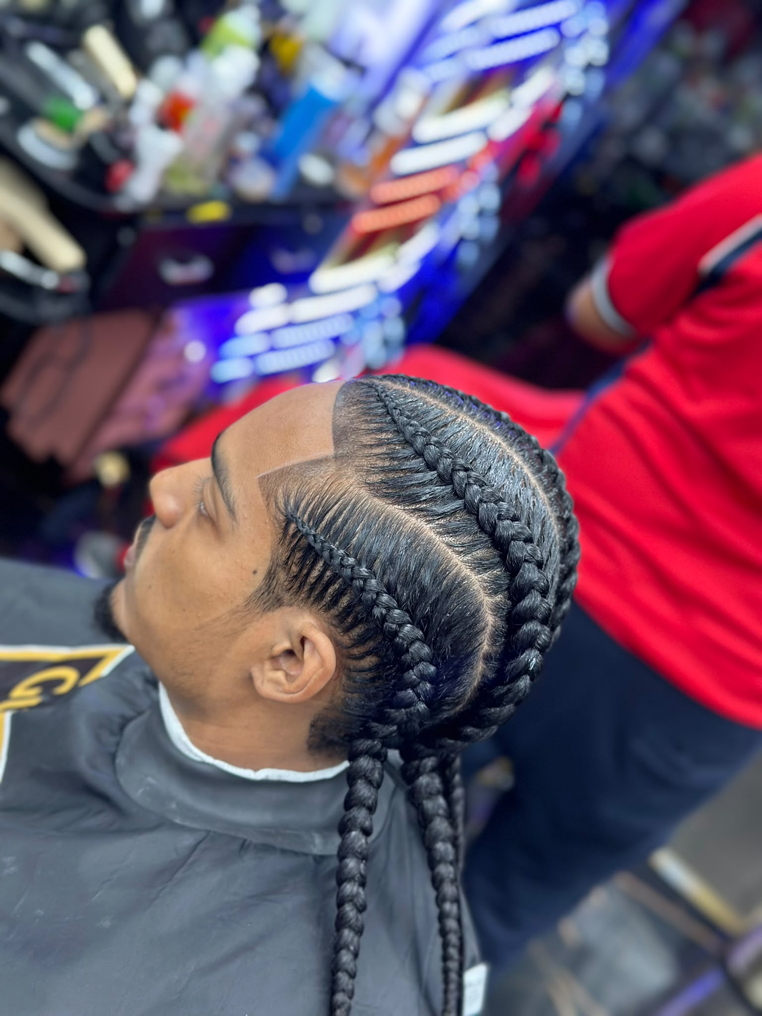 Client hairstyling at Gunners Barber