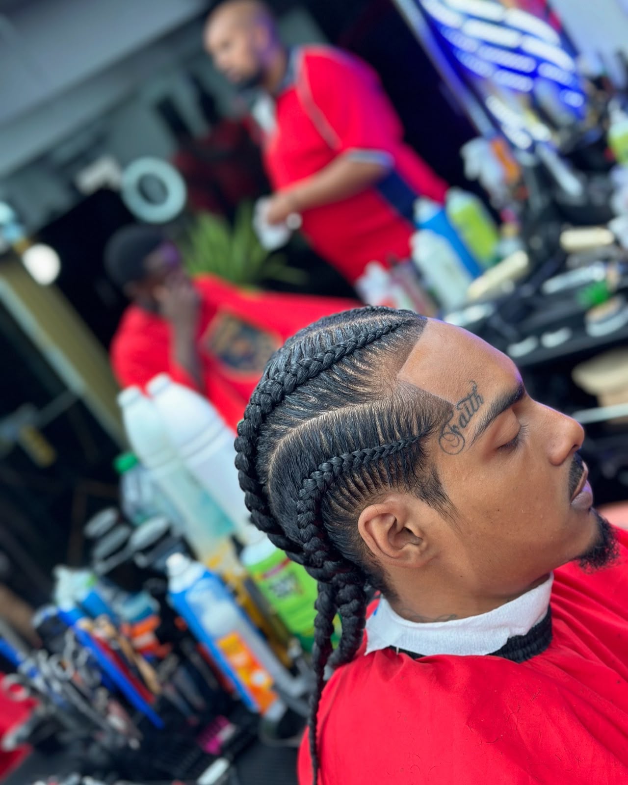 Client hairstyling at Gunners Barber