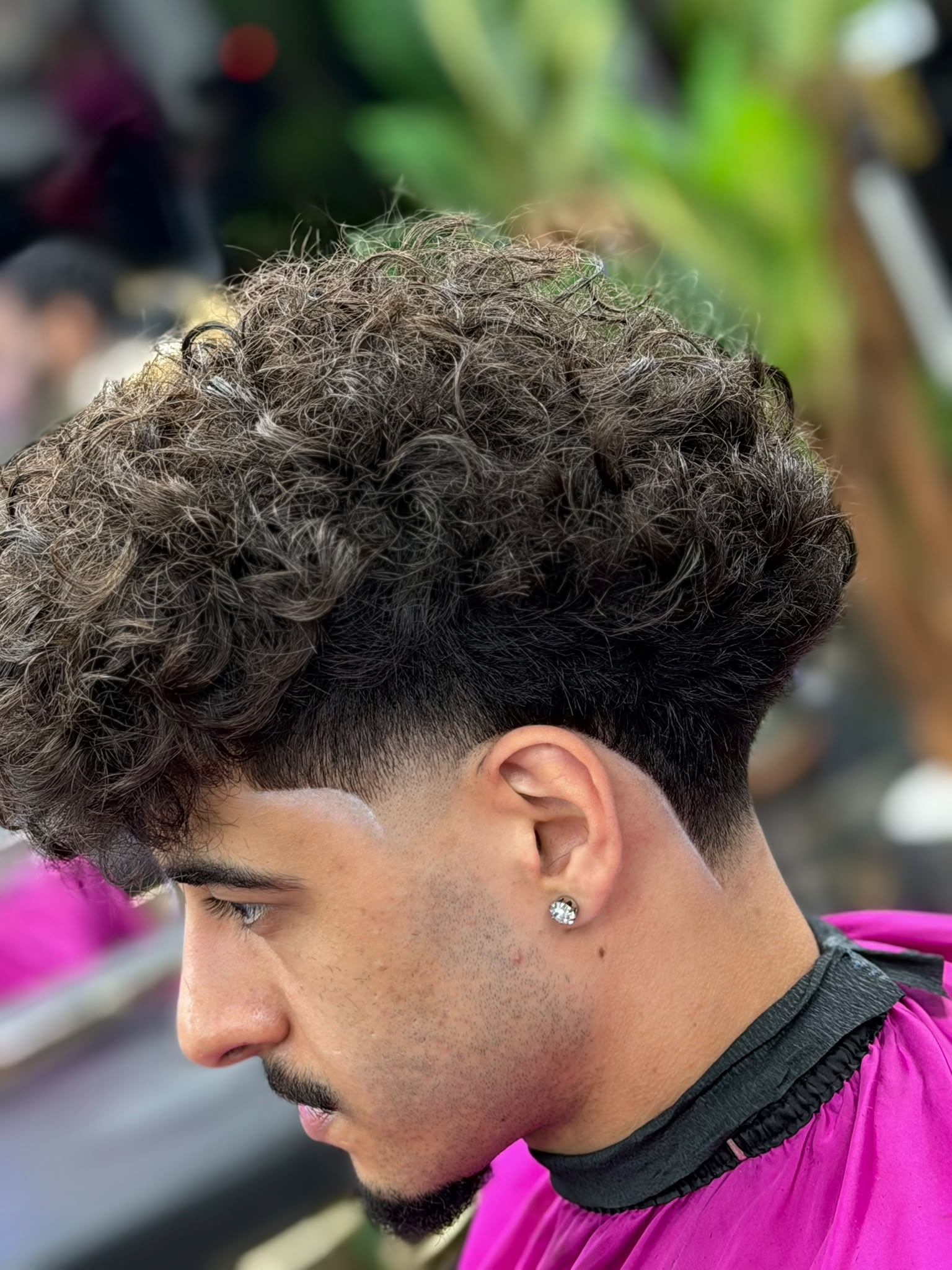 Client hairstyling at Gunners Barber