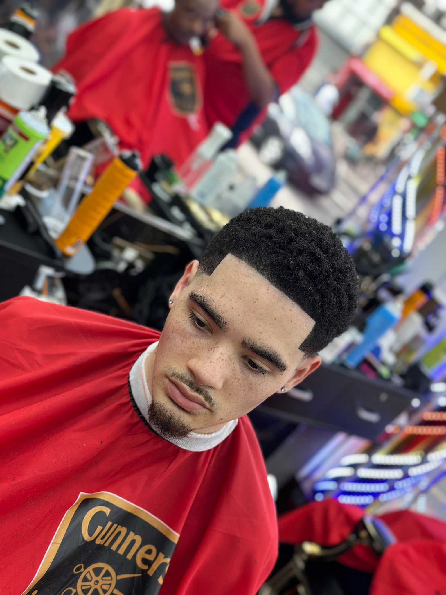 Client hairstyling at Gunners Barber
